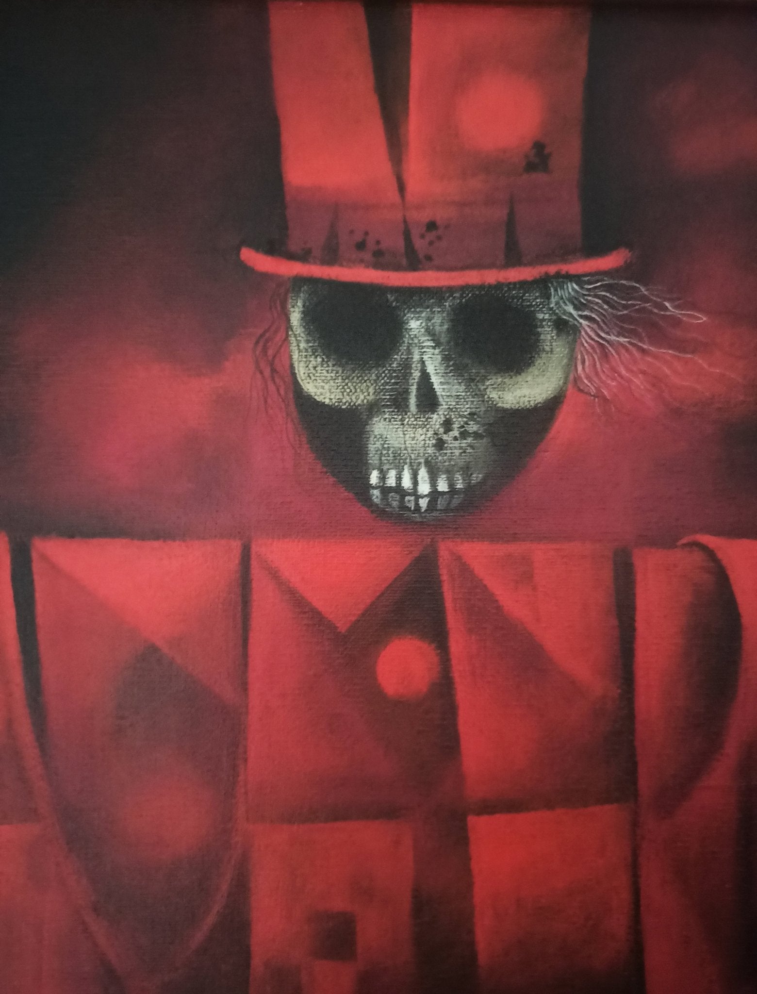 Eduard Alcoy, La colla de espantall: composición surrealista con espantapájaros rojo de rostro esquelético sobre un grupo de figuras geométricas en un paisaje oscuro detalle calavera
