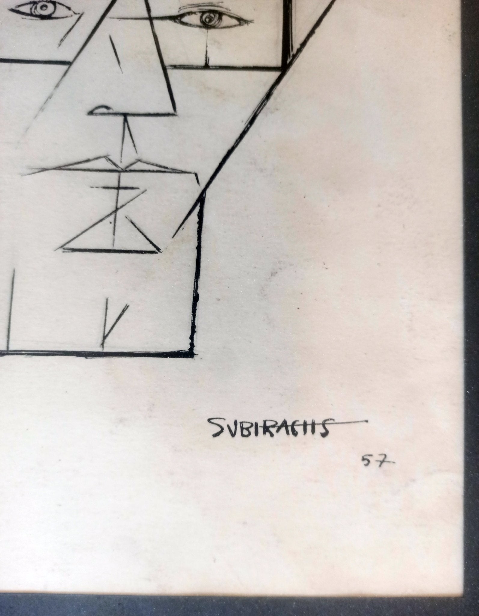 Dibujo a tinta de Subirachs con figuras geométricas abstractas en una cara y rostro lineal en la otra, sobre papel detalle firma y fecha 1957